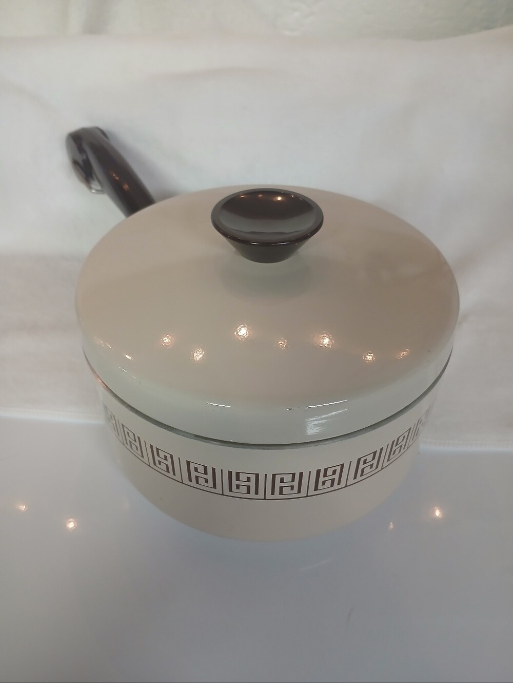 Mirro two liter saucepan and lid, almond and brown colors